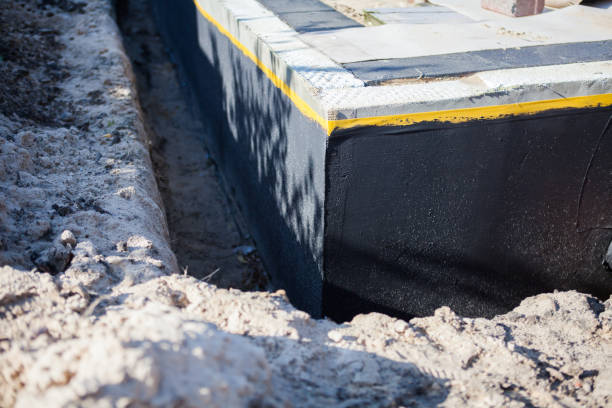 Professional Emergency Waterproofing technician working in Dayton, IN